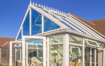 conservatory roof insulation costs Ruan Minor